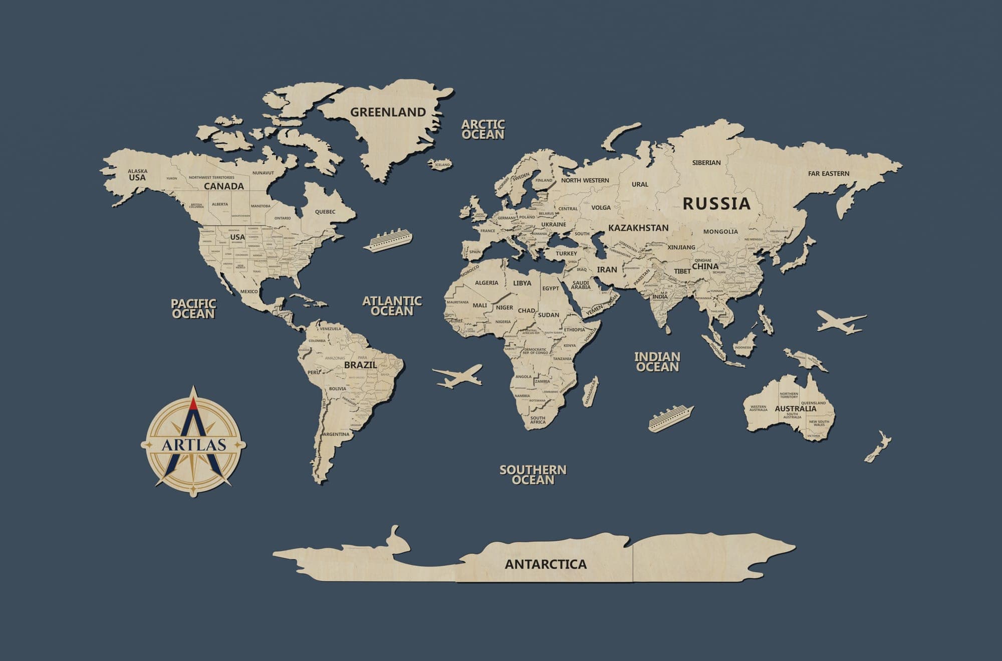 The Wooden World Map in birch, on a plain studio wall
