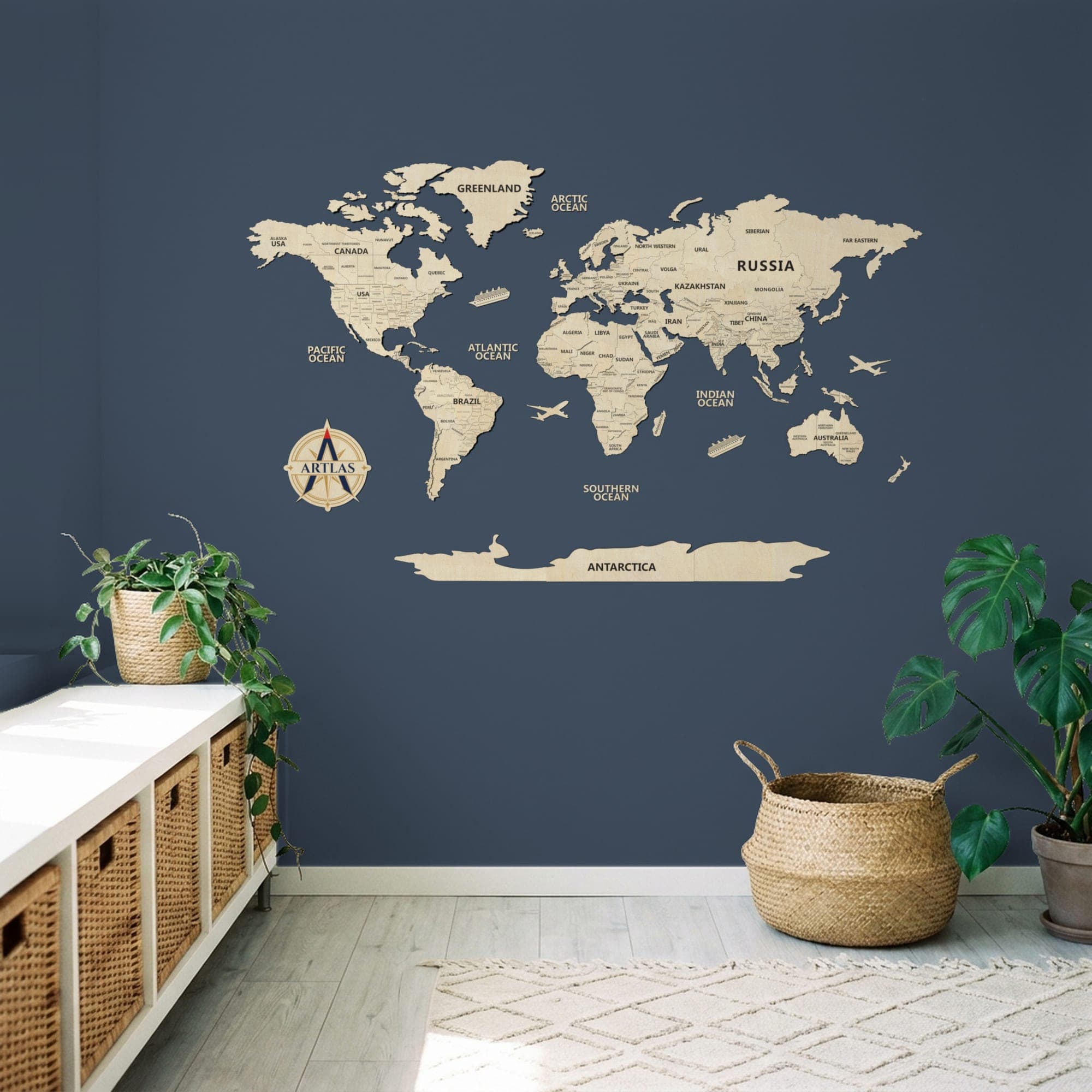 The Wooden World Map in birch on a wall above a console