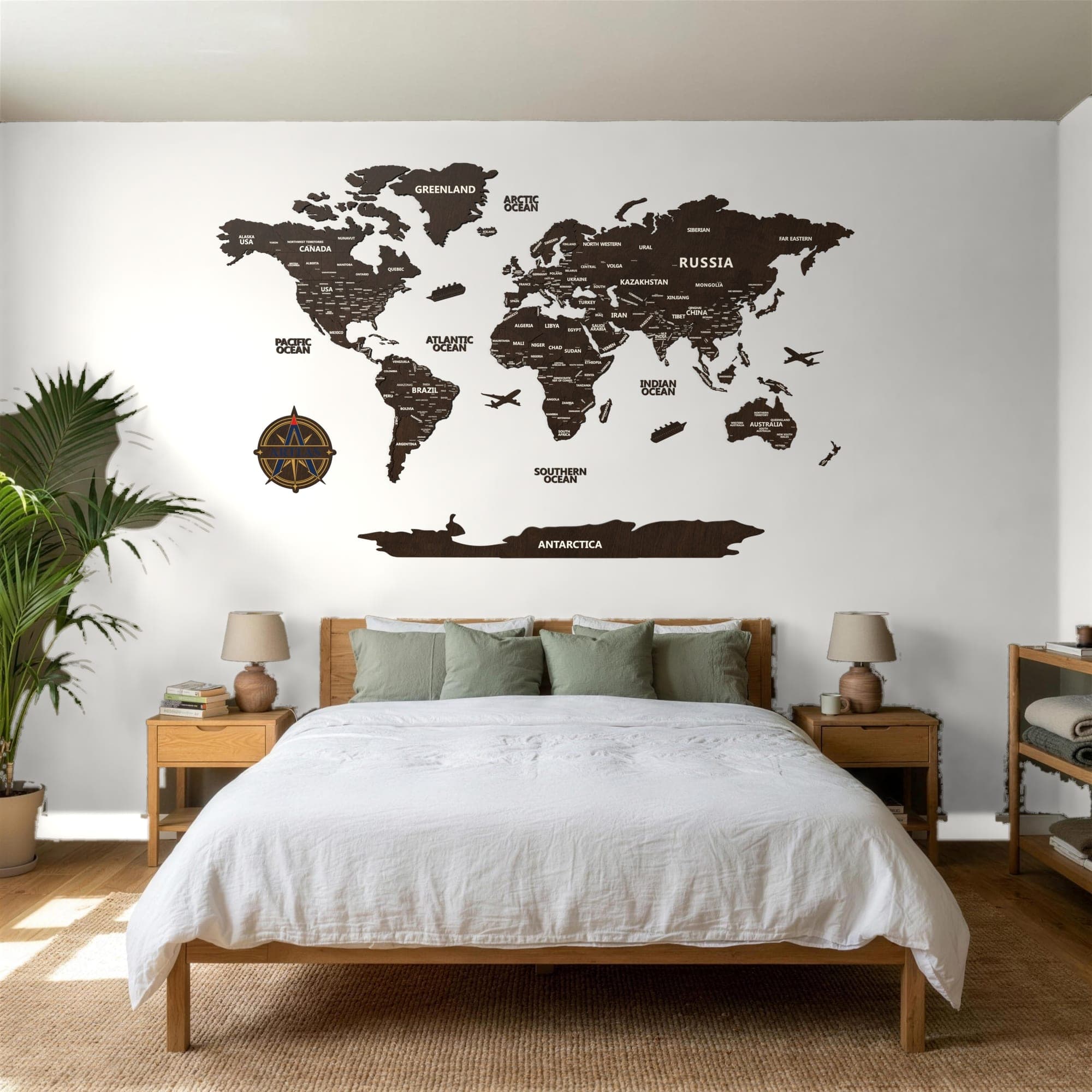 The Wooden World Map in walnut on a dark bedroom wall